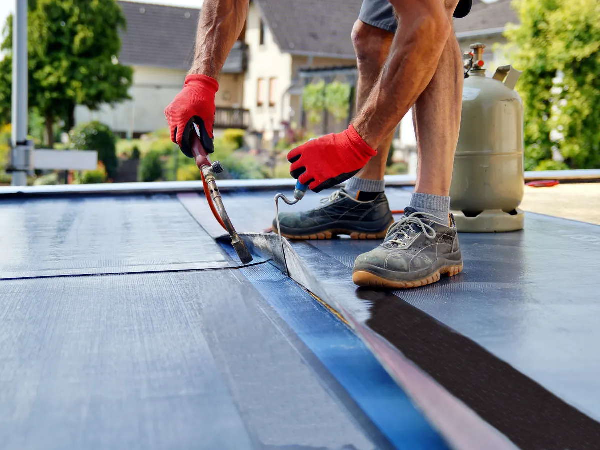 Close view of commercial roofing work in progress